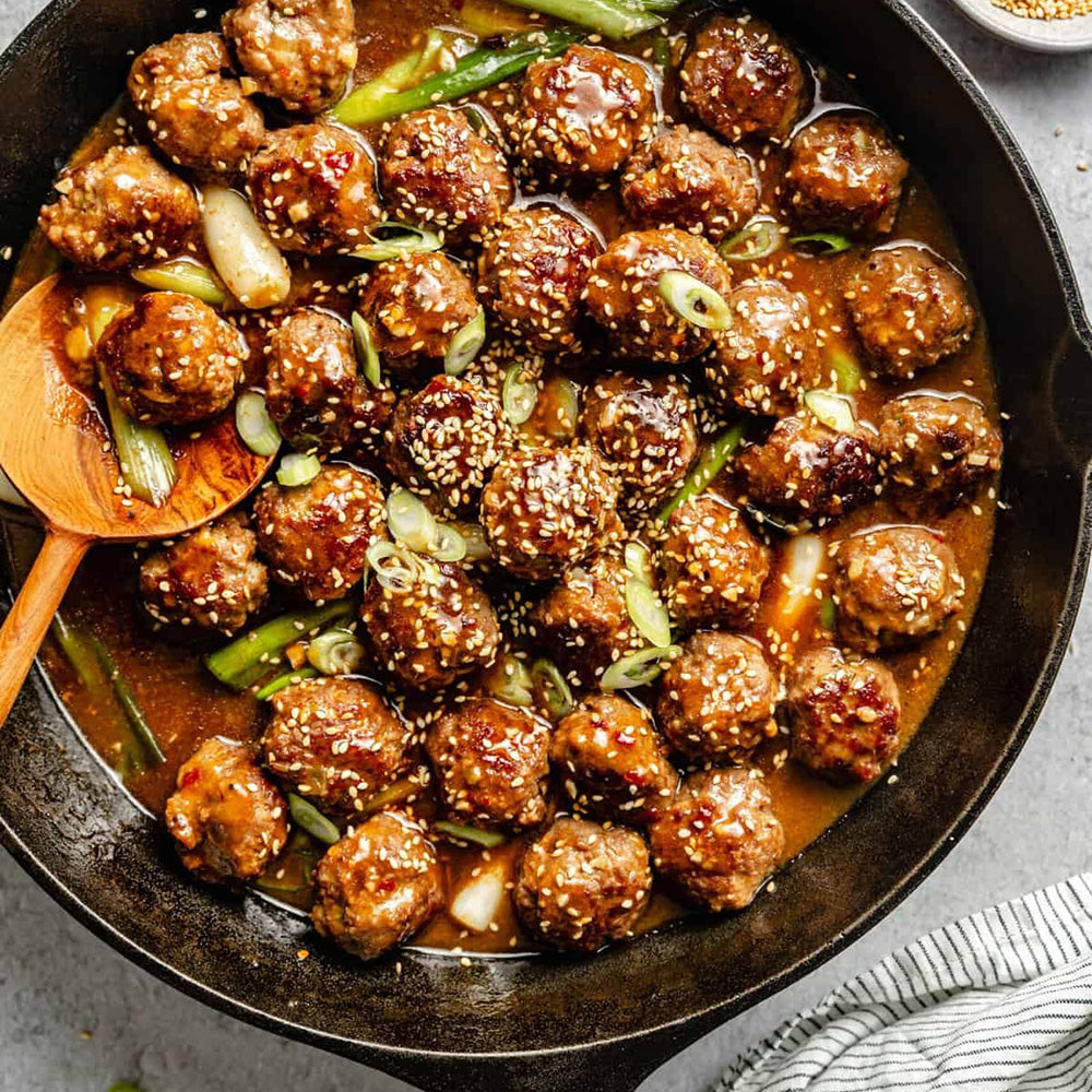 Asian sesame meatballs with garlic green beans and brown rice