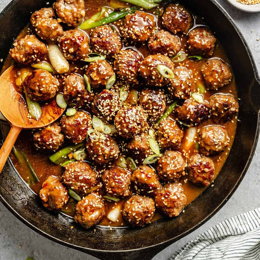 Asian sesame meatballs with garlic green beans and brown rice