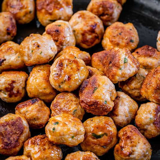 BBQ meatballs with grilled onion and roasted sweet potatoes