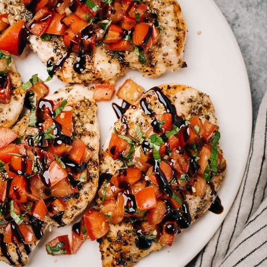 Bruschetta chicken with tomatoes and farro
