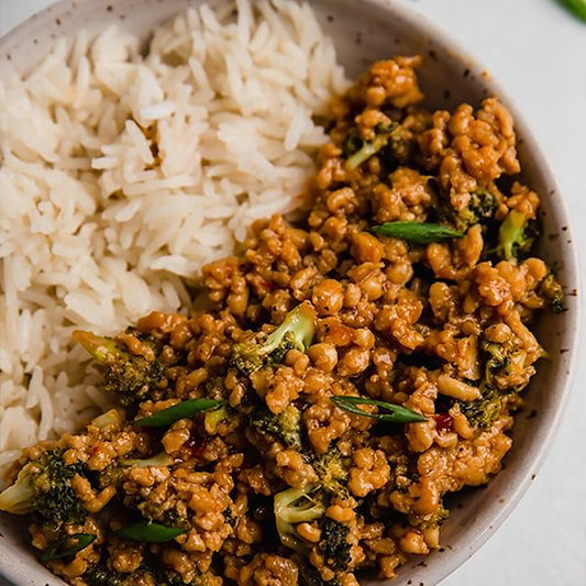 Firecracker turkey bowl with broccoli bits over basmati rice